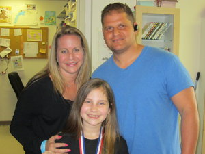 Celiac girl Alexis with parents